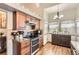 Cozy kitchen featuring wooden cabinets, granite countertops and stainless steel appliances at 6367 Xavier St, Arvada, CO 80003