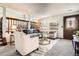 Bright living room with neutral tones, comfortable seating, and stylish decor at 6367 Xavier St, Arvada, CO 80003