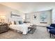 Spacious main bedroom with plush carpeting, ample natural light, and stylish contemporary decor at 6367 Xavier St, Arvada, CO 80003