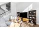 Bright living area showcasing lots of light, with a staircase and modern decor at 2366 Central Park Blvd, Denver, CO 80238