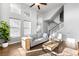 Open living area featuring hardwood floors, tons of light, and modern neutral paint at 2366 Central Park Blvd, Denver, CO 80238