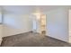 Bedroom with a walk in closet and wall to wall carpet at 62 Newark St # D, Aurora, CO 80012