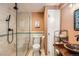 Bathroom features a glass-door shower and wood countertop at 4028 Ames St, Wheat Ridge, CO 80212