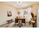 Comfortable office features a hardwood desk and decorative rug at 4028 Ames St, Wheat Ridge, CO 80212
