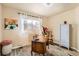 Comfortable office with hardwood floors and stylish furniture at 4028 Ames St, Wheat Ridge, CO 80212