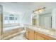 Bright bathroom features a soaking tub, shower, and double vanity with lots of natural light at 234 Carroll Ln, Breckenridge, CO 80424