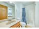 A well lit bathroom with a shower and single sink vanity at 234 Carroll Ln, Breckenridge, CO 80424
