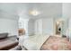 Spacious bedroom featuring sitting area, desk, and comfy queen bed at 234 Carroll Ln, Breckenridge, CO 80424