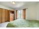 Comfortable bedroom features a large window, a closet, and an additional storage cabinet at 234 Carroll Ln, Breckenridge, CO 80424