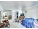 Comfortable carpeted bedroom featuring a full-sized bed, an office area, and plenty of natural light at 234 Carroll Ln, Breckenridge, CO 80424