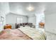 This bedroom is bright, with a seating area, a desk, and a bed with metal frame at 234 Carroll Ln, Breckenridge, CO 80424