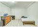Functional bedroom with wood-look flooring, dresser, and twin bed, ideal for flexible living at 234 Carroll Ln, Breckenridge, CO 80424