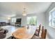 Elegant dining area featuring a large dining table and great natural light at 234 Carroll Ln, Breckenridge, CO 80424