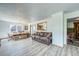 Open living space with wood floors and a seamless flow to the dining area at 234 Carroll Ln, Breckenridge, CO 80424