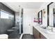 Luxurious bathroom with a glass shower, soaking tub, and double vanity at 5326 Lions Paw St, Castle Rock, CO 80104
