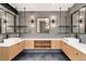 Modern bathroom featuring double sinks, stylish vanities, and sleek fixtures at 5326 Lions Paw St, Castle Rock, CO 80104