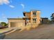 Contemporary home with mixed brick and wood exterior and attached garage at 5326 Lions Paw St, Castle Rock, CO 80104