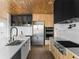 Spacious kitchen with stainless steel appliances, and a large center island with a breakfast bar at 5326 Lions Paw St, Castle Rock, CO 80104