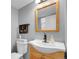 Charming bathroom features a well-lit vanity and classic decor, creating a cozy atmosphere at 5976 S Jellison St # E, Littleton, CO 80123