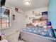 Cozy bedroom with plush carpet, double closet, and a window offering natural light and neighborhood views at 5976 S Jellison St # E, Littleton, CO 80123