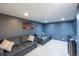 Cozy living room with plush sofas, a TV, and recessed lighting at 5976 S Jellison St # E, Littleton, CO 80123