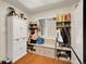 Functional mudroom features storage cabinets, bench seating, and built-in shelving, offering plenty of space at 5976 S Jellison St # E, Littleton, CO 80123