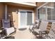 Inviting patio area with comfortable seating, ideal for outdoor relaxation at 5976 S Jellison St # E, Littleton, CO 80123