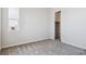 Bedroom featuring carpet floors, closet, a window offering neighborhood views, and neutral walls at 13695 Emerald Lake St, Parker, CO 80138