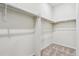Walk-in closet with shelving and carpet, offering ample storage space at 13695 Emerald Lake St, Parker, CO 80138