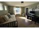 Inviting bedroom with daybed, desk, and natural light from the large window at 7408 Sodalite Way, Castle Rock, CO 80108