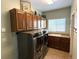 Well-organized laundry room featuring modern washer and dryer units and ample storage at 7408 Sodalite Way, Castle Rock, CO 80108