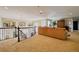 Open and spacious living area with custom railings and elegant decorations at 7408 Sodalite Way, Castle Rock, CO 80108