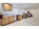 Basement area with a countertop, sink, cabinets, and storage at 3823 S Uravan St, Aurora, CO 80013