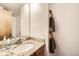Bathroom featuring granite counters and modern fixtures at 3823 S Uravan St, Aurora, CO 80013