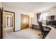 Bright bedroom with a built-in desk and large window, providing a comfortable workspace at 3823 S Uravan St, Aurora, CO 80013