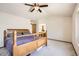 Large main bedroom with neutral walls and ensuite bathroom at 3823 S Uravan St, Aurora, CO 80013
