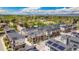 Community featuring modern townhomes with solar panels and manicured landscaping at 7808 W 43Rd Pl, Wheat Ridge, CO 80033