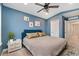 Comfortable bedroom with a ceiling fan and natural light at 7808 W 43Rd Pl, Wheat Ridge, CO 80033