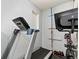 An exercise area featuring a treadmill and stationary bike, perfect for home fitness at 7808 W 43Rd Pl, Wheat Ridge, CO 80033