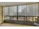 Enclosed balcony with privacy blinds provides outdoor views and natural light for a relaxing atmosphere at 13961 E Marina Dr # 314, Aurora, CO 80014