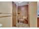 Bathroom featuring frameless glass shower and seat, and updated tiling at 13961 E Marina Dr # 314, Aurora, CO 80014