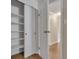View of a walk-in closet featuring custom shelving for maximum organization at 13961 E Marina Dr # 314, Aurora, CO 80014
