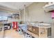 Room with kilns and storage for crafting projects at 13961 E Marina Dr # 314, Aurora, CO 80014