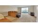 Bright living room with a sliding glass door to balcony and comfortable seating at 13961 E Marina Dr # 314, Aurora, CO 80014
