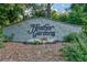Heather Gardens brick signage with vibrant flower bed at 13961 E Marina Dr # 314, Aurora, CO 80014