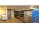 Basement features stairs, utility sink, and appliances, offering functionality at 4635 Teller St, Wheat Ridge, CO 80033