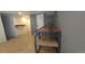 Partially finished basement with a utility sink and room to add more storage at 4635 Teller St, Wheat Ridge, CO 80033