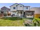 Backyard with patio, furniture, and landscaped features at 11727 Oswego St, Commerce City, CO 80640