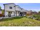 Backyard featuring lush greenery and patio area at 11727 Oswego St, Commerce City, CO 80640