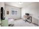 Bright bedroom with neutral walls, a large window, and comfortable furnishings create an inviting space at 11727 Oswego St, Commerce City, CO 80640